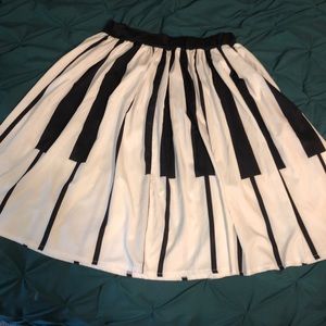 Pleated Piano themed skirt. Worn once!